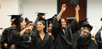 Graduate kids in gowns