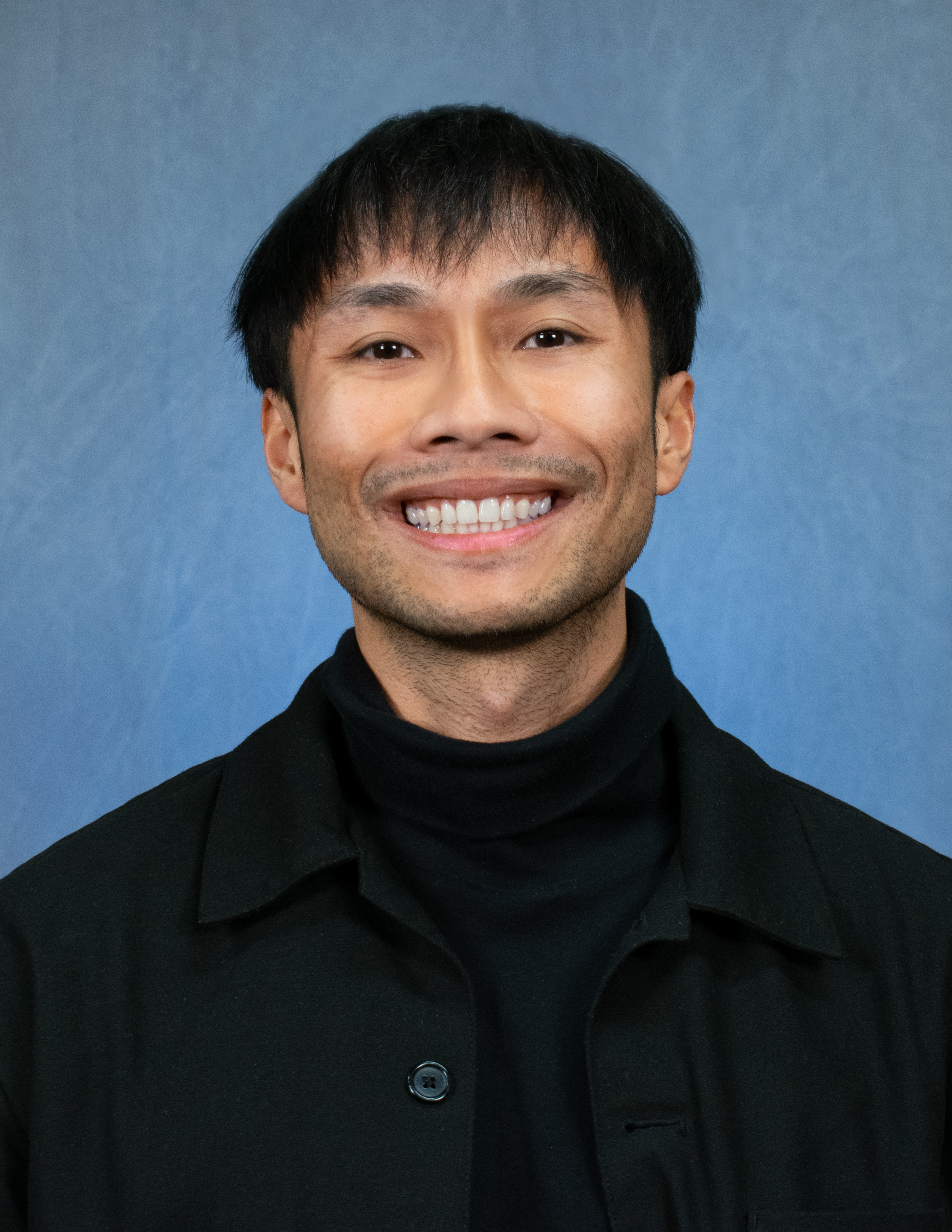 Philip Truong headshot for the year you better walk around like daft punk.jpg