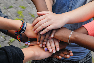 hands joined in friendship