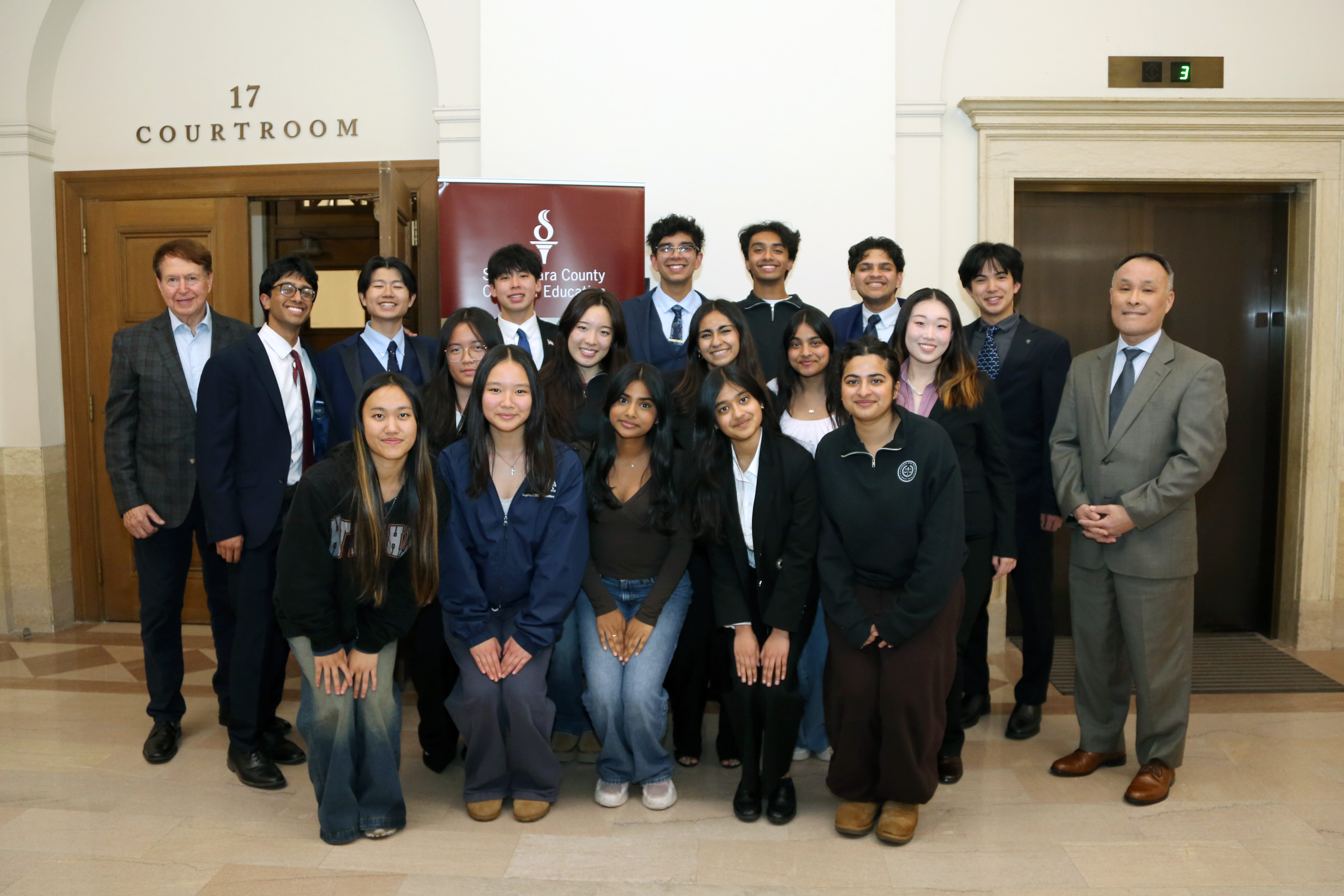 Lynbrook High School team outside of the courtroom