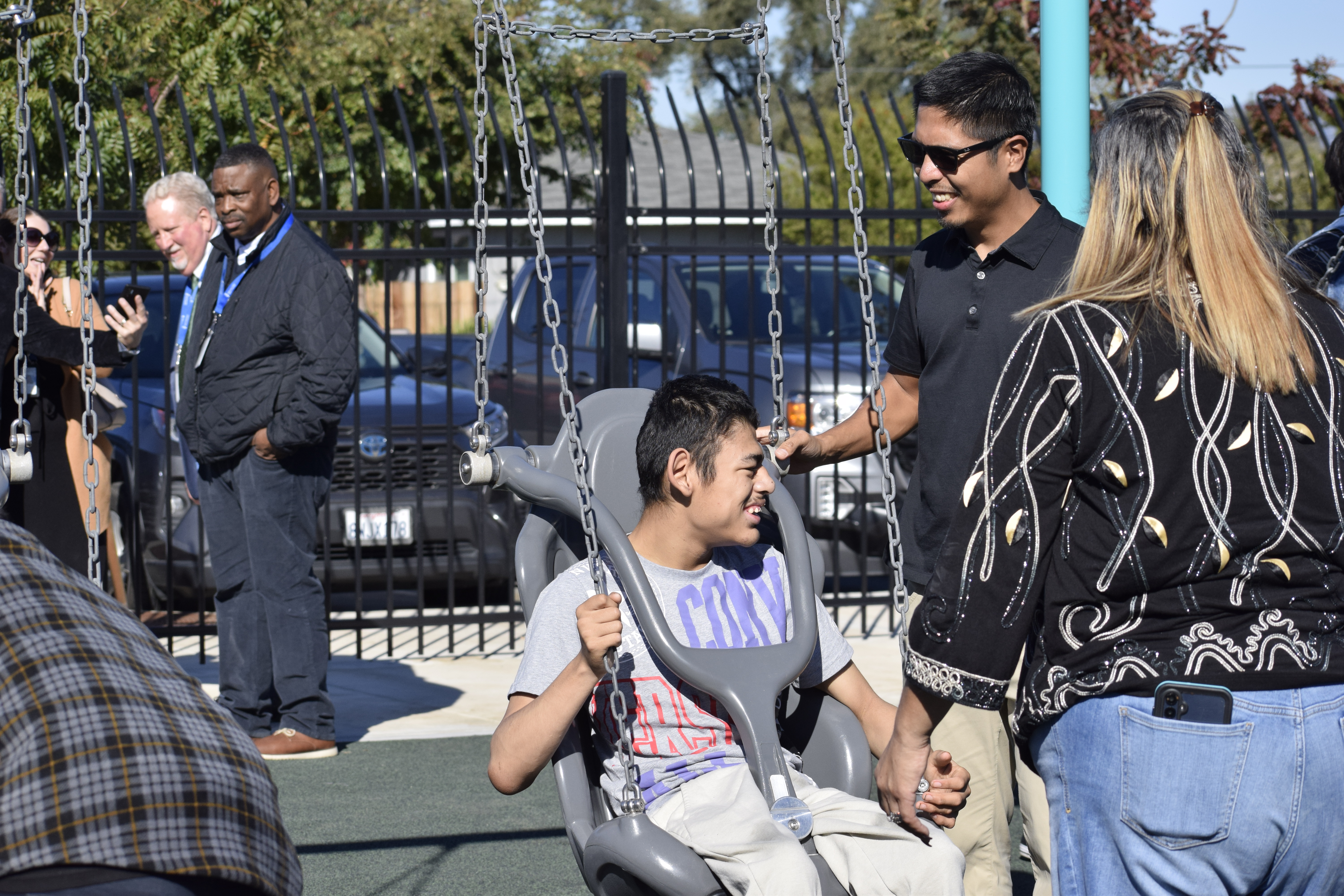 student on an adaptive swing