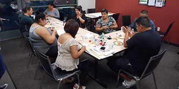 Staff meeting around L shaped table